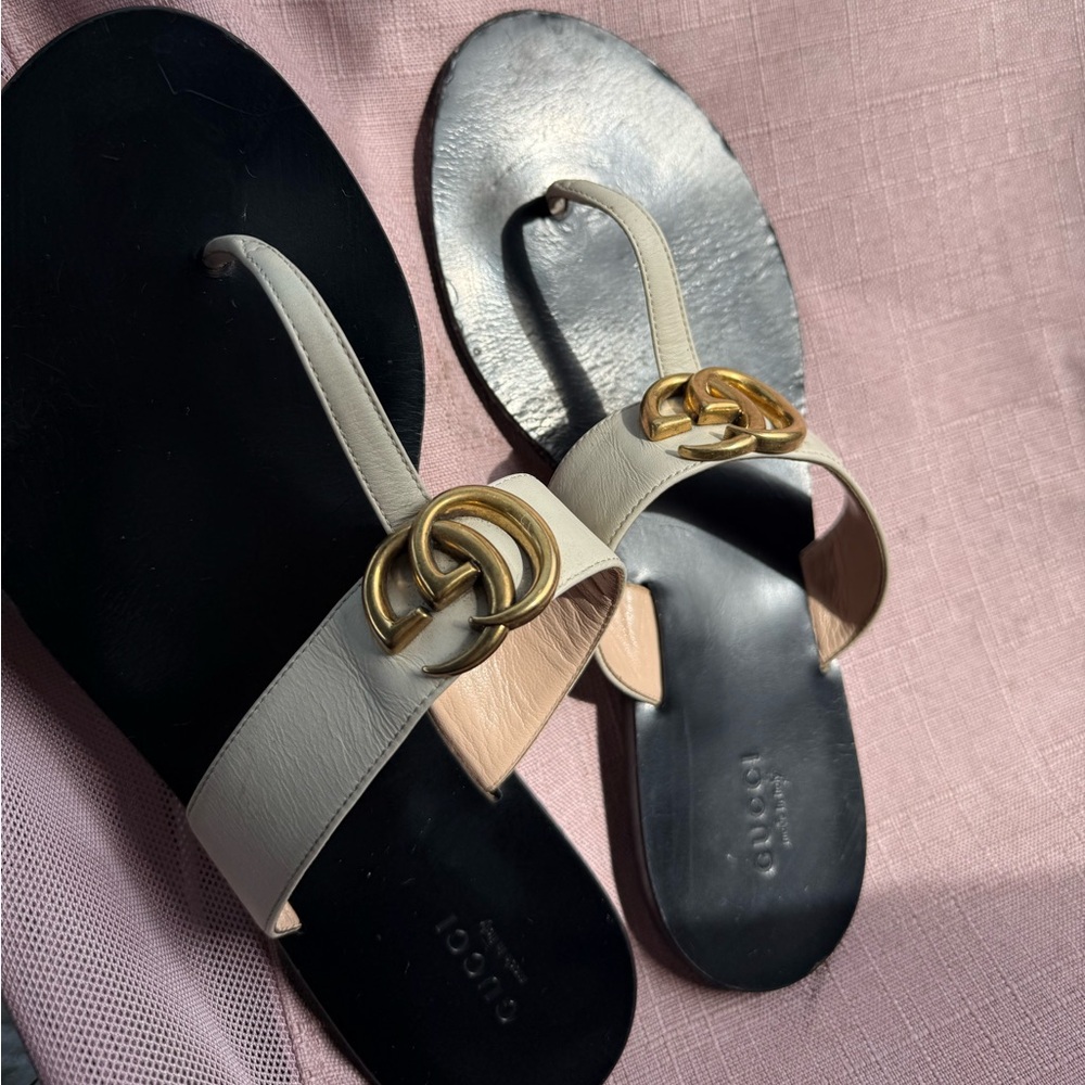 Gucci Black and White Sandals with Gold Accents